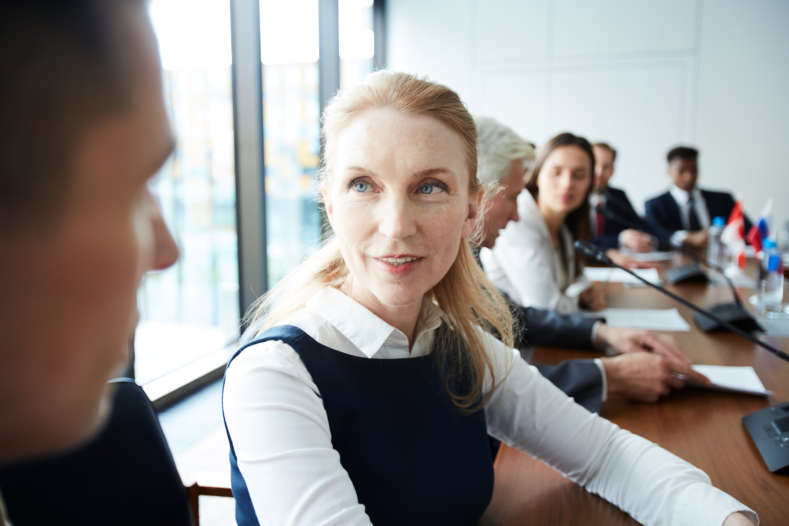 woman shouting with microphone about job vacancy